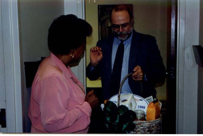 D.Smith giving Gift Basket to E. Clayton