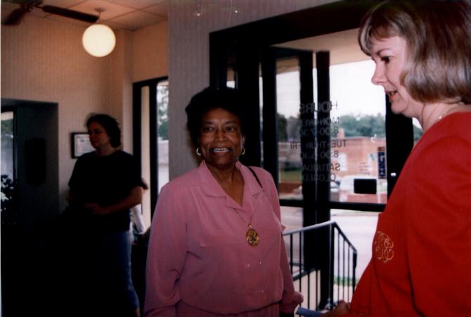 L. Hardy chatting with E. Clayton (D)