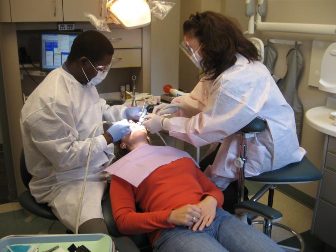 A dental patient receives treatment