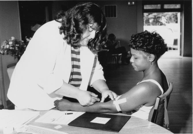 A patient receives bloodwork