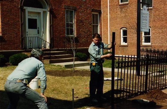 A fence being mended at a CHC, Inc. location