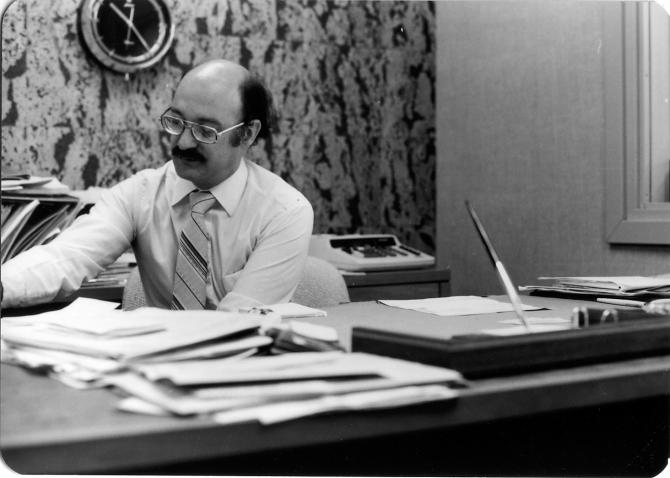 Jerry Weitzman working at his desk