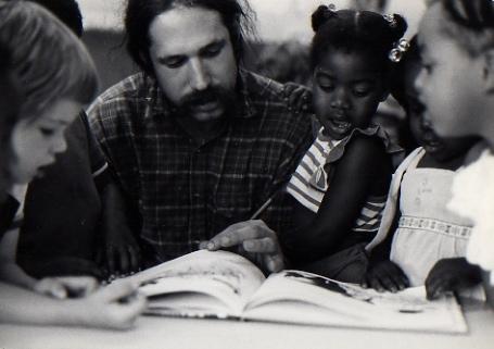 Mark Masselli reading with children