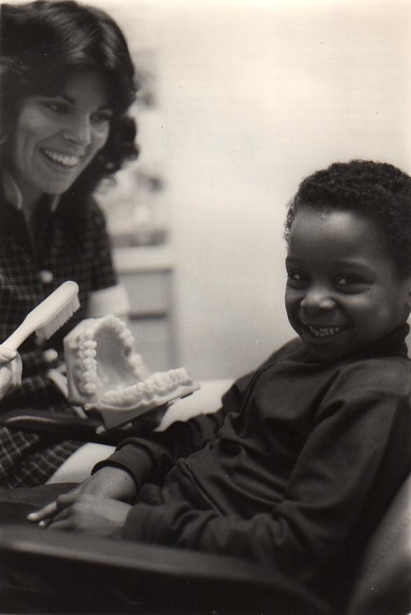 A young boy in the dentist's chair