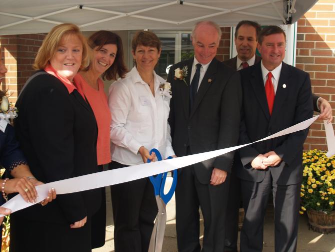 Participants gather before the ribbon cutting