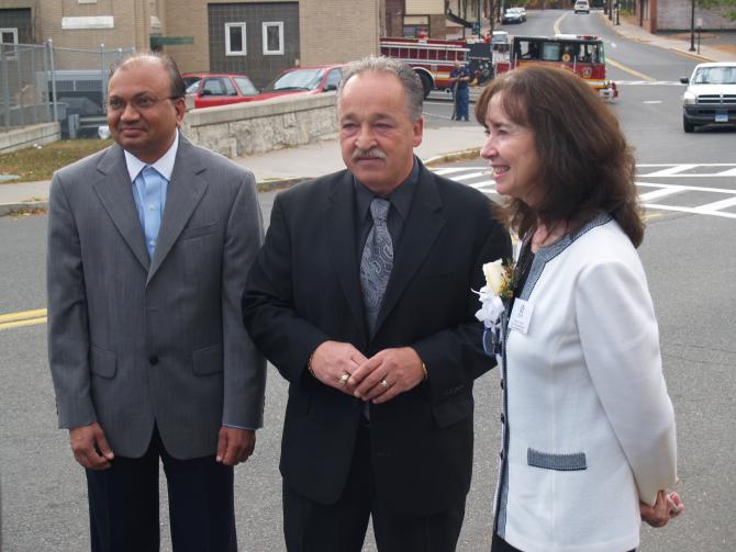 Two men and Margaret outside