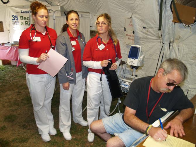 Nurses running a blood pressure booth