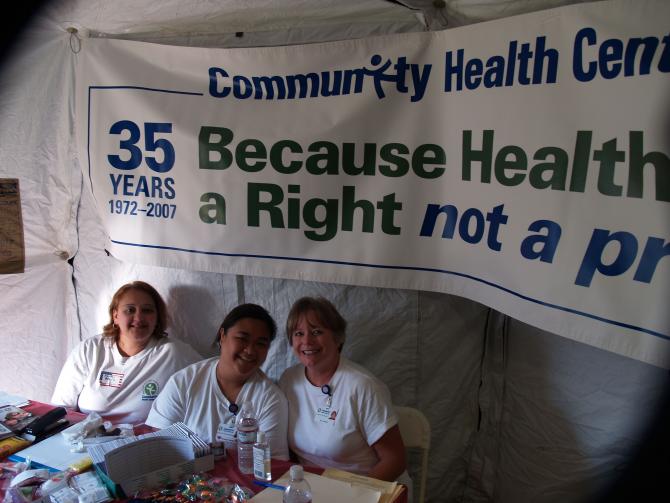 Three women at the CHC, Inc. health fair tent
