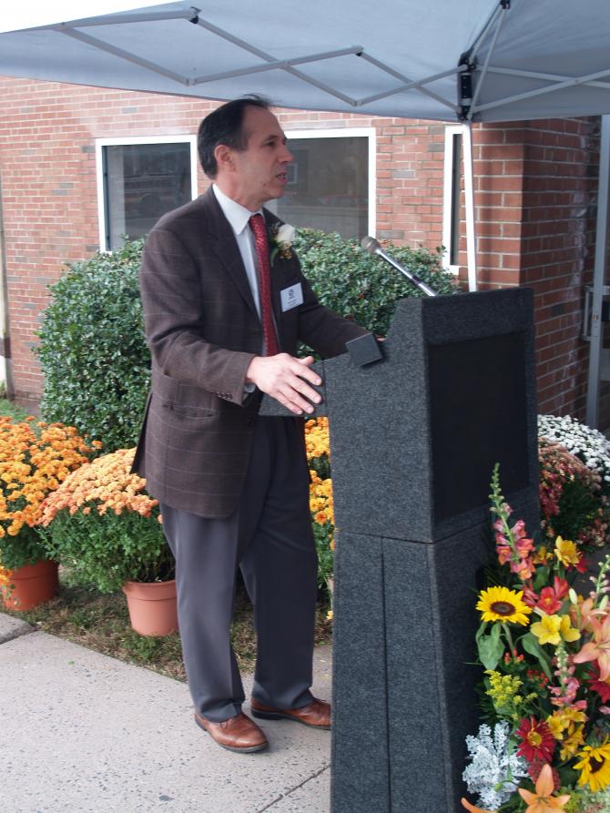Mark Masselli speaking at the opening