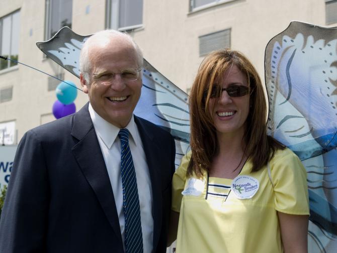 Two staff members at the Norwalk opening