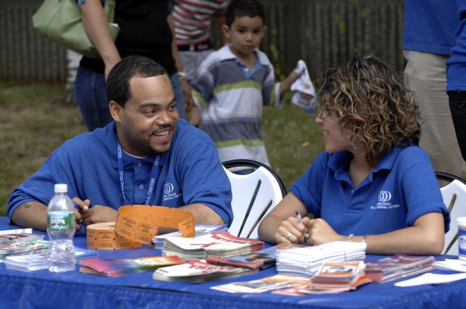 Staff at an information table