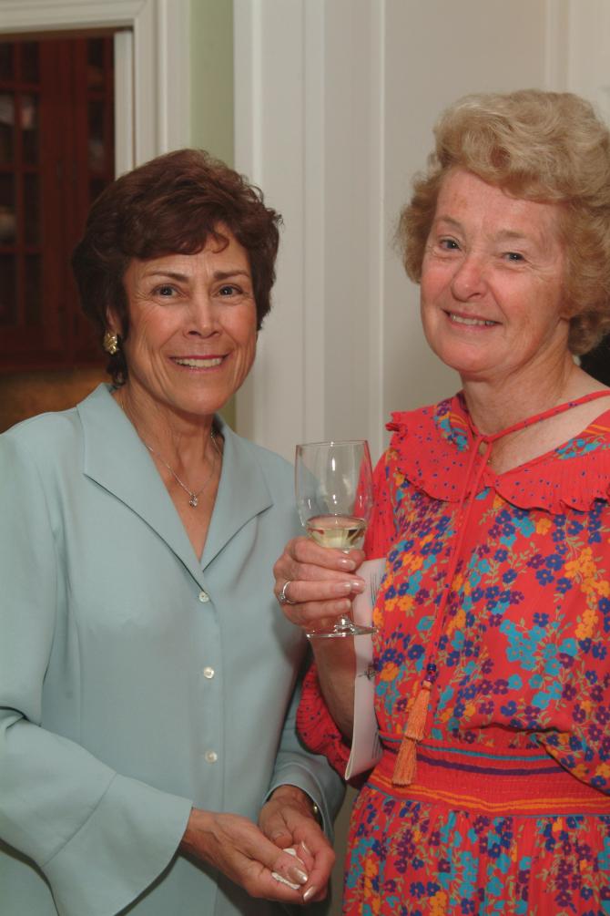 Two women enjoying the event