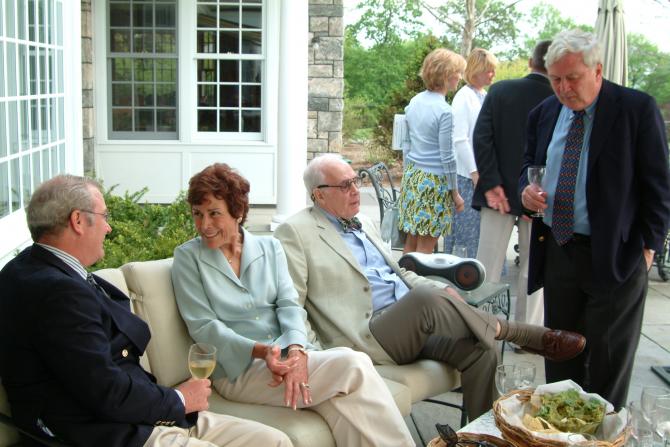 Attendees enjoying the patio couch