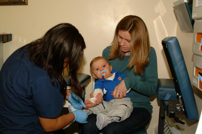 A young boy receives a check-up