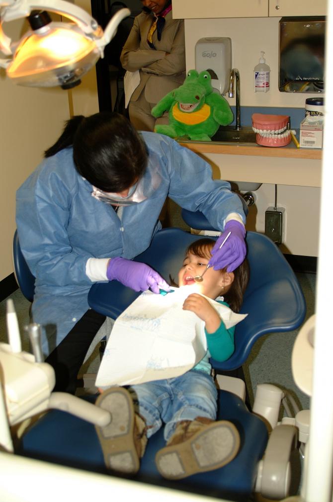 Little girl having her dental exam