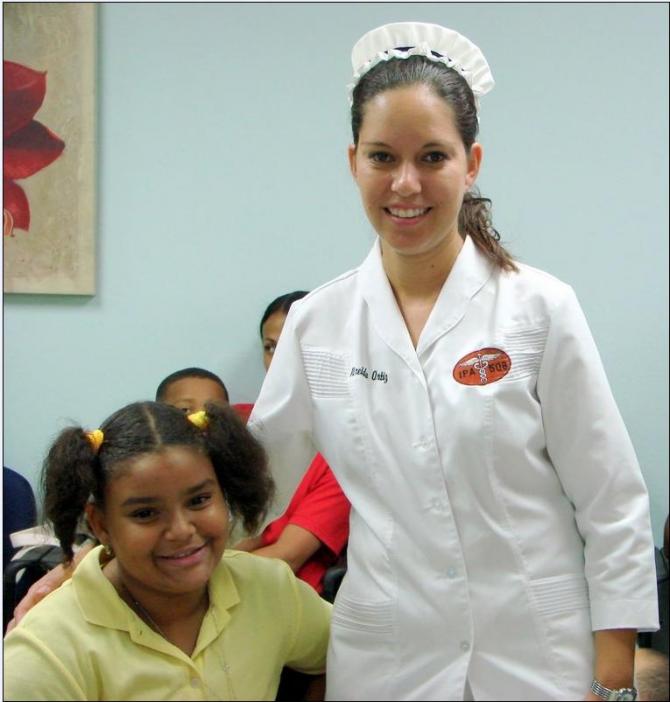 Nurse with patient in waiting room