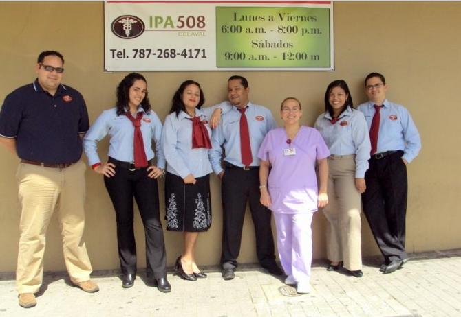 Staff in front of clinic