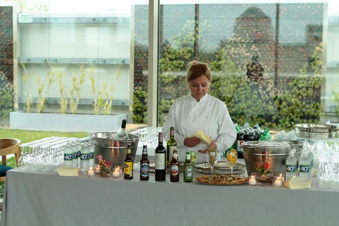 Food is set up near the rooftop garden