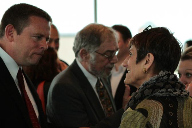 Rep. Rosa DeLauro talks with a guest
