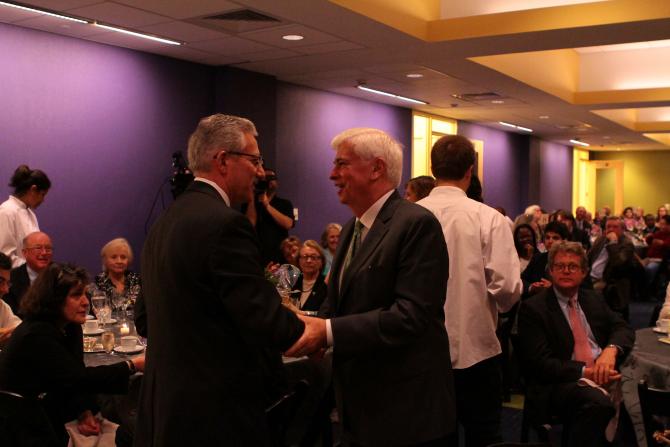 Senator Dodd talks with guests