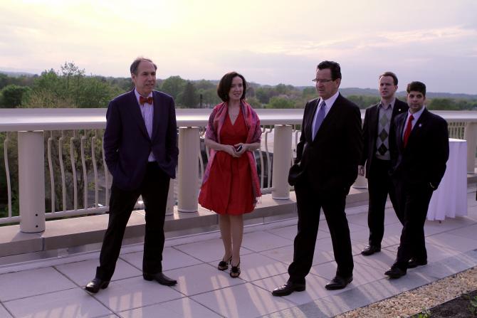 Guests take in the view from the rooftop