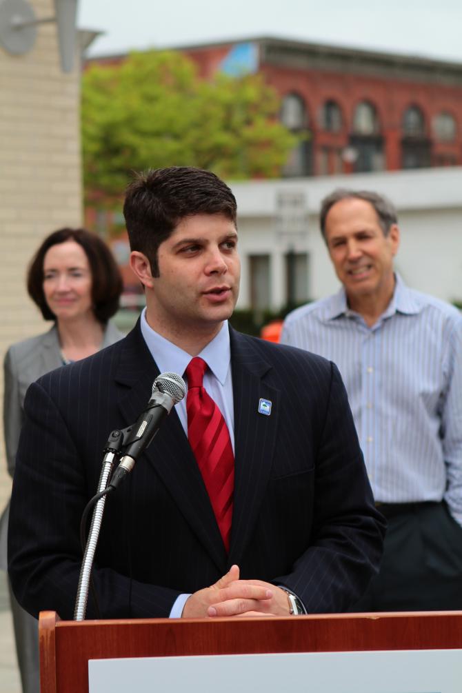 Mayor Dan Drew talks outside the new building