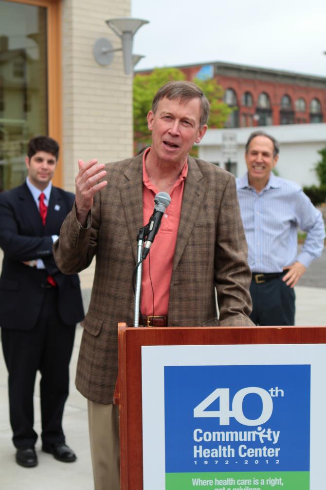 Gov. Hickenlooper talks outside the new building