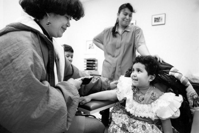 Girl at her well-child check-up 