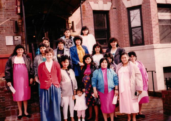 Group of pregnant patients with Mary’s Center’s nurse in the front of the center’s first location at a basement in Adams Morgan (1988)