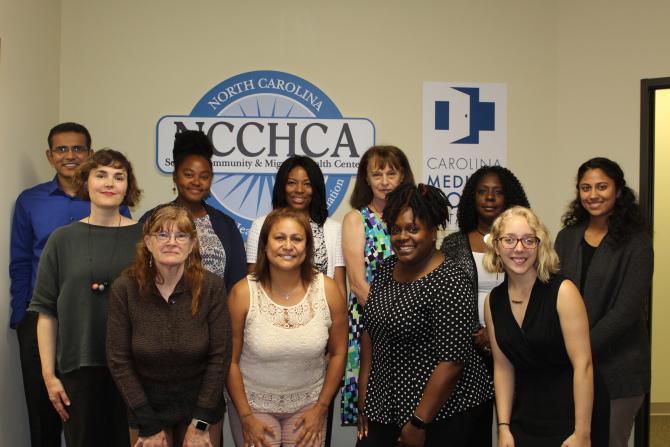 Staff with our three summer interns in 2018