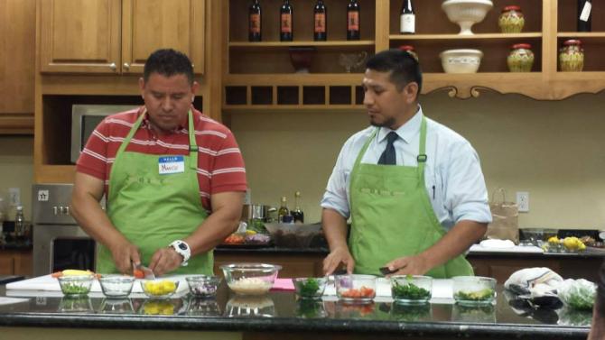 Marco Donis and Ismael Celedon demonstrate how to make shrimp ceviche with mango. Did you know ceviche originated in Peru.